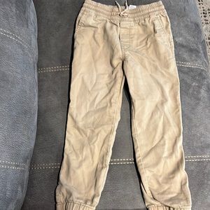 Boys Cat & Jack pants beige. Size 6/7